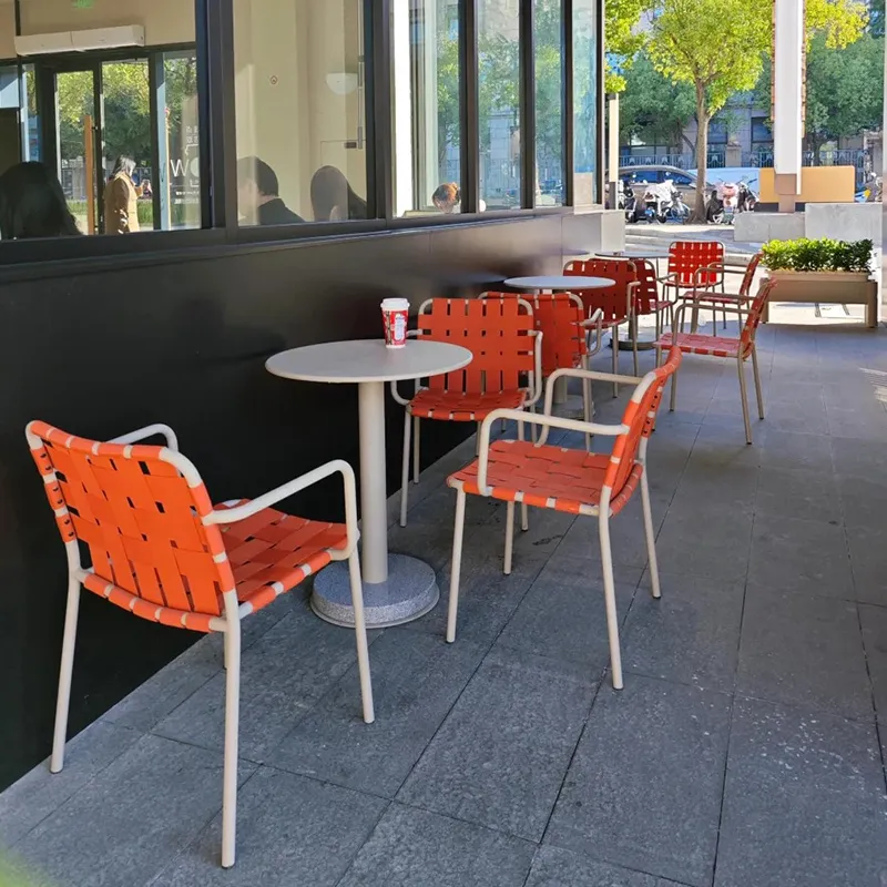 Outdoor dining chairs and tables on a patio