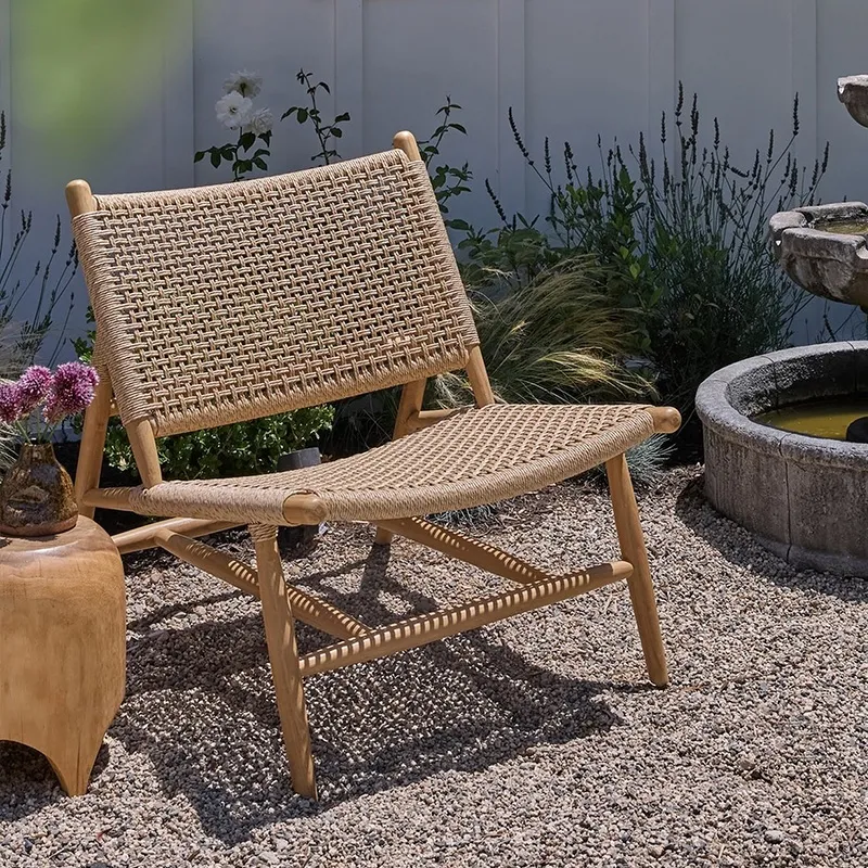 Woven Outdoor Lounge Chair Woven outdoor lounge chair in garden