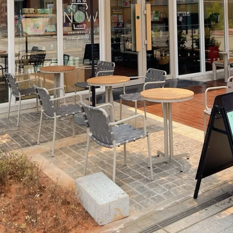 Outdoor dining tables and chairs on a terrace