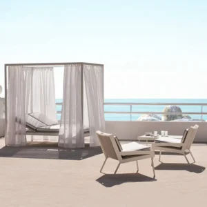 Outdoor rattan lounge chairs by the sea